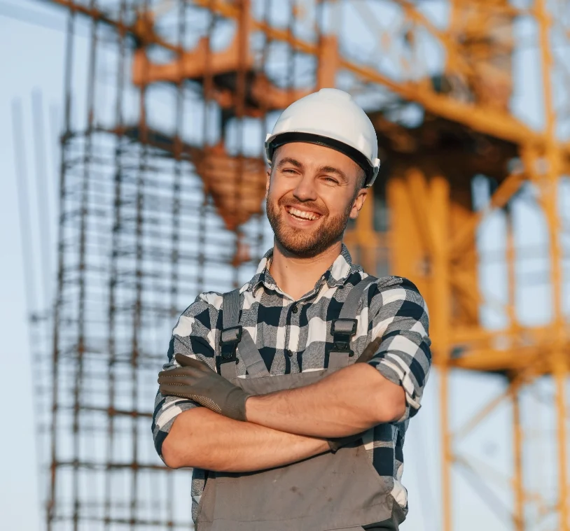 happy-worker-is-standing-on-the-construction-site-2023-01-19-04-17-50-utc-1-2